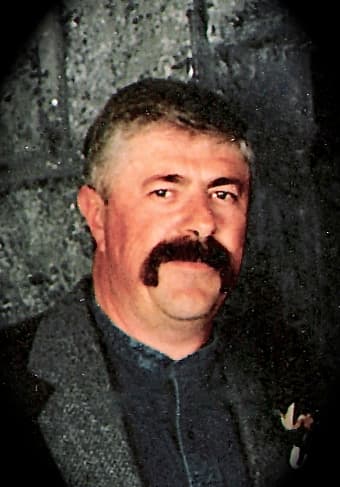 John Ernest Comin